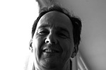 testimonial-skip-01 face, man, human, person, gentleman, white, faces, portrait, men, adult, black and white, friendly, smile, gray smile